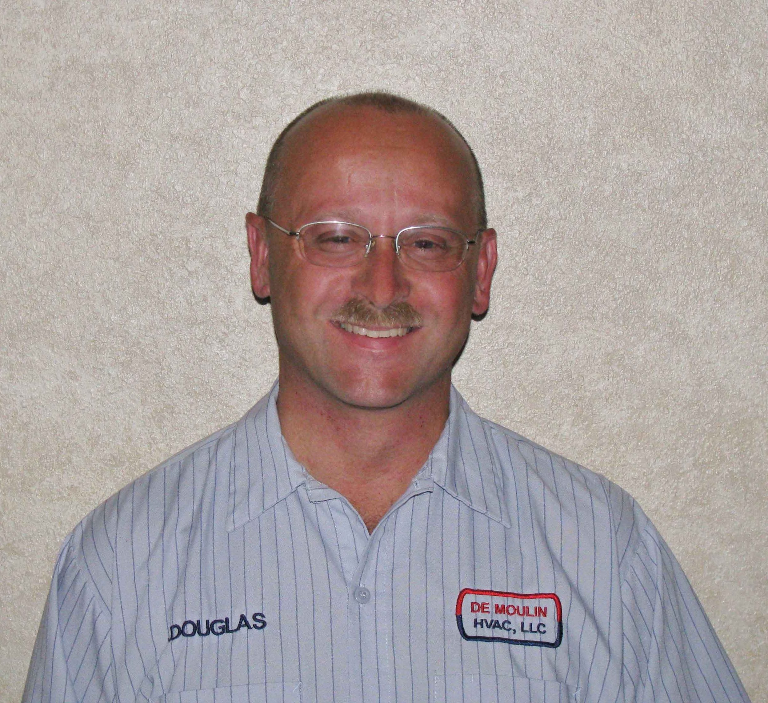 Douglas J. De Moulin